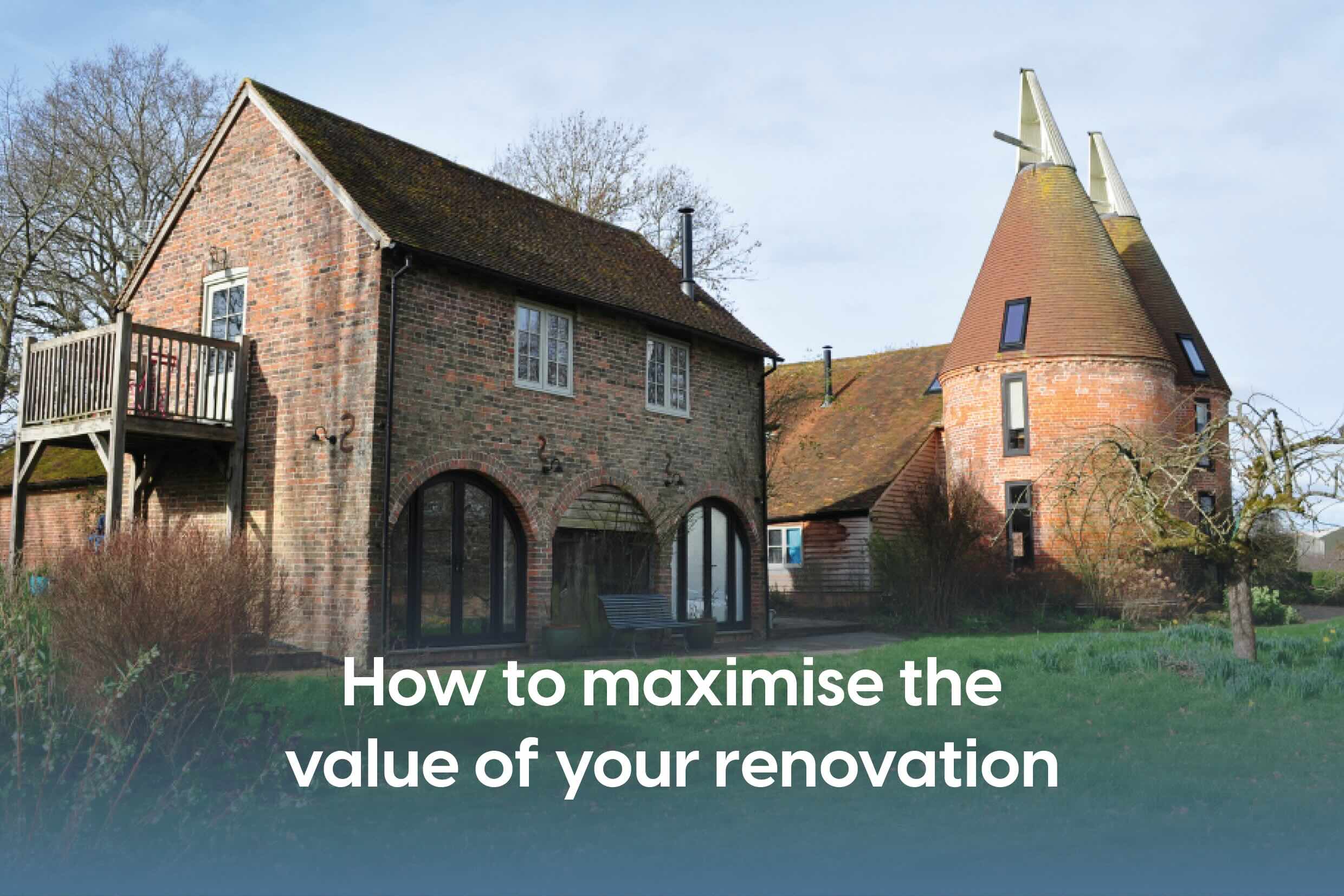 Exterior shot of a beautiful farmhouse, oast and granary conversion with arched windows and doors, two cows and green lawn in the foreground.